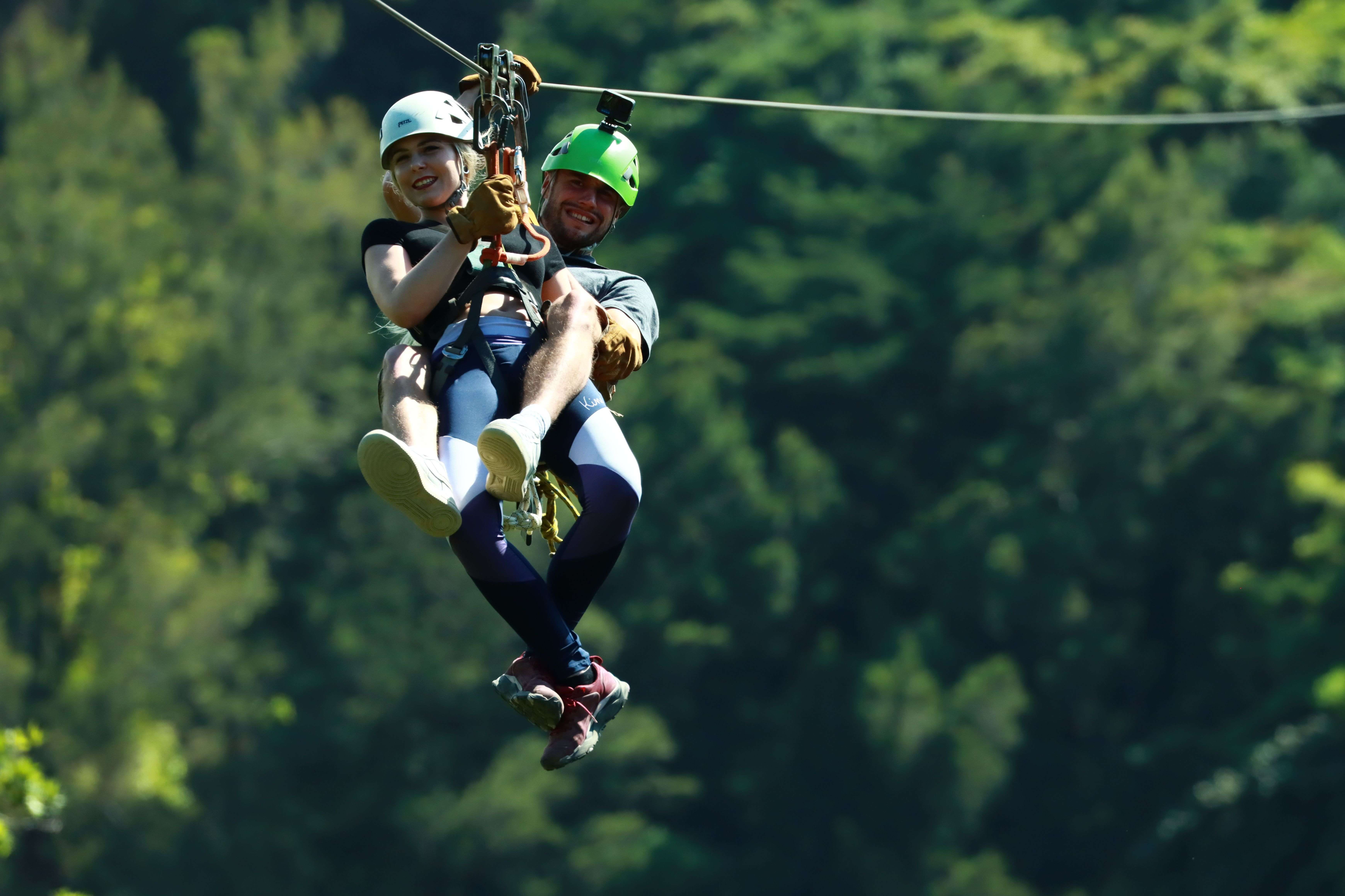 Share the thrill of ziplining with a partner while flying high above Monteverde's breathtaking forest.